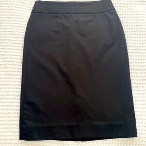 Banana Republic - Black classic, mid-length pencil skirt. Never worn